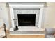 Close up of a cozy fireplace perfect for chilly nights in the living room at 653 Southridge Ct, Westfield, IN 46074