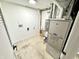 Spacious utility room with washer/dryer hookups and a new furnace at 653 Southridge Ct, Westfield, IN 46074