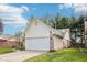 Lovely single-Gathering home with a two-car garage, brick and siding exterior, and well-maintained landscaping at 6853 Arjay Dr, Indianapolis, IN 46217