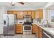 Functional kitchen with stainless steel appliances and ample cabinet space at 6853 Arjay Dr, Indianapolis, IN 46217