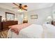 Inviting main bedroom with dresser, hardwood floors, and soft lighting at 6853 Arjay Dr, Indianapolis, IN 46217