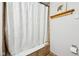 Classic shower featuring a curtain and grab bar for added safety at 6853 Arjay Dr, Indianapolis, IN 46217