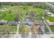 An aerial view of a home with solar panels and a spacious, well-kept lawn and backyard at 8051 Sycamore Springs Trl, Indianapolis, IN 46239