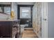 Stylish bathroom with vanity, floral shower curtain, and neutral finishes at 8051 Sycamore Springs Trl, Indianapolis, IN 46239