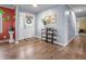 A welcoming foyer with a decorative table, modern lighting, and attractive flooring at 8051 Sycamore Springs Trl, Indianapolis, IN 46239