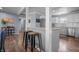 Bright kitchen featuring granite counters, stainless appliances, white subway tile backsplash, and updated cabinetry at 8051 Sycamore Springs Trl, Indianapolis, IN 46239