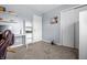 Bright and airy home office space with closet, shelving, and a desk at 8051 Sycamore Springs Trl, Indianapolis, IN 46239