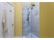 Bathroom showcasing a modern glass-enclosed shower with marble-style tile at 8069 Middle Bay Ln, Indianapolis, IN 46236