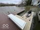 Private dock with boat and kayak slips, perfect for waterfront activities and adventures at 8069 Middle Bay Ln, Indianapolis, IN 46236