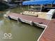 Private dock with boat slips providing easy access to the water for recreational activities at 8069 Middle Bay Ln, Indianapolis, IN 46236