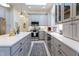 Stylish kitchen with gray cabinets, stainless steel appliances, and a beautiful central island at 8069 Middle Bay Ln, Indianapolis, IN 46236