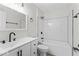 Stylish bathroom featuring modern vanity, subway tile, and black fixtures at 8216 Glenwillow Ln # 104, Indianapolis, IN 46278
