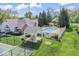 Community amenities include a swimming pool and tennis court for residents to enjoy at 8216 Glenwillow Ln # 104, Indianapolis, IN 46278