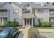 Charming front entrance with a well-maintained walkway and neatly trimmed bushes at 8216 Glenwillow Ln # 104, Indianapolis, IN 46278
