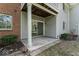 Outdoor patio area that provides an opportunity to unwind and enjoy the surrounding scenery at 8216 Glenwillow Ln # 104, Indianapolis, IN 46278