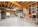 Spacious unfinished basement with exposed beams, ready for customization and design at 8850 W 225 S, Columbus, IN 47201
