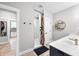 Modern bathroom featuring double sinks, stylish fixtures, a walk-in shower, and modern accents at 8850 W 225 S, Columbus, IN 47201