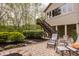 Outdoor patio sitting area and lush foliage, providing a tranquil retreat at 8901 Shetland Ln, Indianapolis, IN 46278