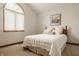 Cozy bedroom featuring a large window, plush bedding, and neutral decor for a relaxing atmosphere at 8901 Shetland Ln, Indianapolis, IN 46278