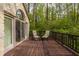 Inviting deck featuring chairs, pillows, and sliding doors, offering a relaxing outdoor space at 8901 Shetland Ln, Indianapolis, IN 46278