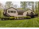 A beautiful home with stone accents and lush landscaping at 8901 Shetland Ln, Indianapolis, IN 46278