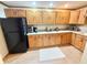 Functional kitchen equipped with modern appliances, ample cabinet space, and a clean countertop area at 8901 Shetland Ln, Indianapolis, IN 46278