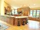 Gourmet kitchen with custom cabinetry, granite countertops, stainless steel appliances, and a cozy breakfast nook at 8901 Shetland Ln, Indianapolis, IN 46278