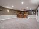 Finished basement with a bar at 9243 Compton Farm Ln, Indianapolis, IN 46259