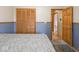 A bedroom shows a closet and door at 9243 Compton Farm Ln, Indianapolis, IN 46259