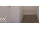 A small closet with carpet at 9243 Compton Farm Ln, Indianapolis, IN 46259