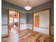 View of the dining room showcasing the open flow into the living room and entryway at 9243 Compton Farm Ln, Indianapolis, IN 46259