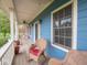 Charming front porch with comfortable seating and classic architectural details at 9243 Compton Farm Ln, Indianapolis, IN 46259