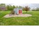 Backyard shed on a gravel foundation adding extra storage on the property at 9243 Compton Farm Ln, Indianapolis, IN 46259