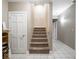 A carpeted staircase at 9243 Compton Farm Ln, Indianapolis, IN 46259