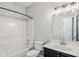 Bathroom with shower/tub combo, vanity, and bright lighting at 963 Kempson Ct, Westfield, IN 46074