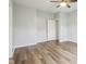 Empty bedroom with hardwood floors and gray walls at 963 Kempson Ct, Westfield, IN 46074