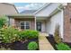 Home's entryway boasts well-maintained landscaping and a welcoming front porch at 963 Kempson Ct, Westfield, IN 46074