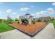 Enjoy the community playground with modern equipment and a -safe ground covering at 963 Kempson Ct, Westfield, IN 46074