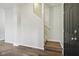 Entryway featuring hardwood flooring and a staircase with neutral-toned walls at 963 Kempson Ct, Westfield, IN 46074
