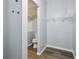 Empty walk-in closet that leads to a bathroom with a toilet and sink at 963 Kempson Ct, Westfield, IN 46074
