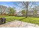 Expansive backyard with lush green grass and privacy fence, ideal for outdoor activities at 9688 Amber Glow Ct, Fishers, IN 46037