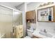 Bright bathroom featuring a shower, a vanity with sink and wooden cabinet for storage at 9688 Amber Glow Ct, Fishers, IN 46037
