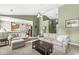 Comfortable living room with neutral furniture and an open view to the kitchen at 9688 Amber Glow Ct, Fishers, IN 46037