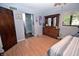 Bathroom with modern wooden floors and ensuite shower at 1000 Riverview Dr, Martinsville, IN 46151