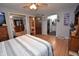 Bedroom with hardwood floors and ensuite bathroom create a functional and stylish space at 1000 Riverview Dr, Martinsville, IN 46151