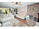 Relaxing living room featuring a cozy fireplace, plush seating, and modern décor at 1000 Riverview Dr, Martinsville, IN 46151