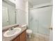 Standard bathroom with shower and tub combination and single sink vanity with storage underneath at 10822 Cape Coral Ln, Indianapolis, IN 46229