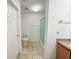 Functional bathroom with a shower, toilet, and vanity featuring practical tile flooring at 10822 Cape Coral Ln, Indianapolis, IN 46229