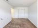 Neutral bedroom with sliding closet doors and lots of natural light at 10822 Cape Coral Ln, Indianapolis, IN 46229