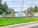 Welcome to Bloom at German Church Senior Living, featuring lush landscaping and a charming entrance at 10822 Cape Coral Ln, Indianapolis, IN 46229